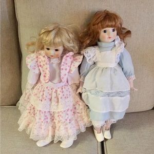 2 Porcelain dolls.